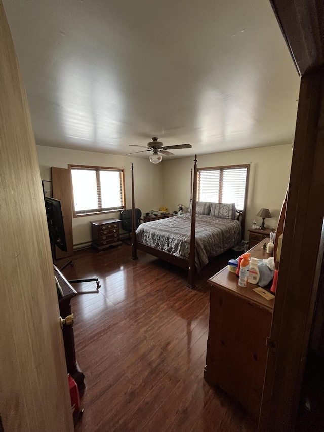 bedroom featuring ceiling fan and wood finished floors