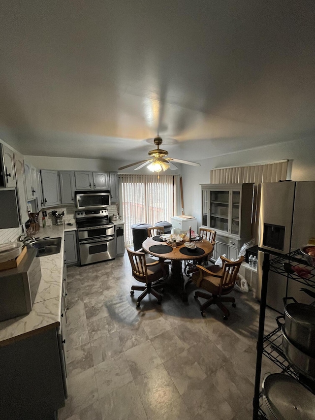 dining area featuring ceiling fan