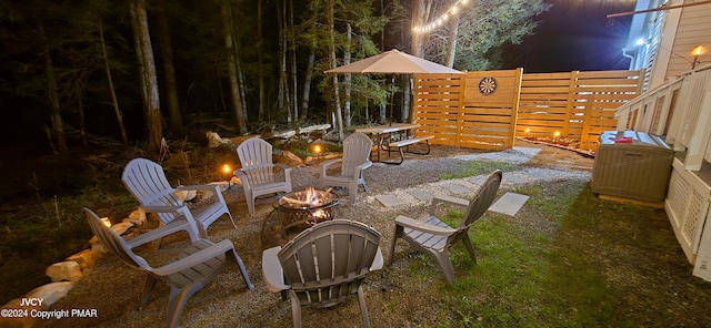 view of patio / terrace featuring a fire pit