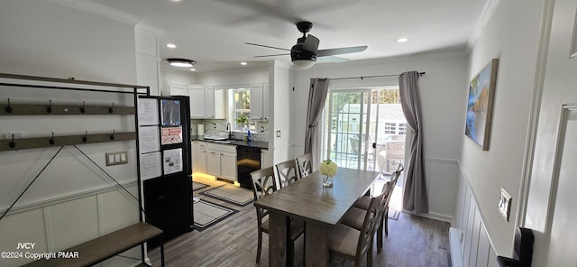 dining area with ceiling fan, ornamental molding, wood finished floors, and recessed lighting