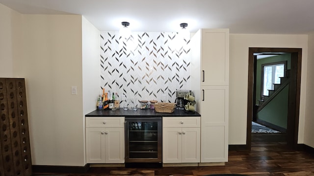 104 Haverhill Rd, Buck Hill Falls, PA 18323 - indoor dry bar with beverage cooler, dark wood-type flooring, and stairway