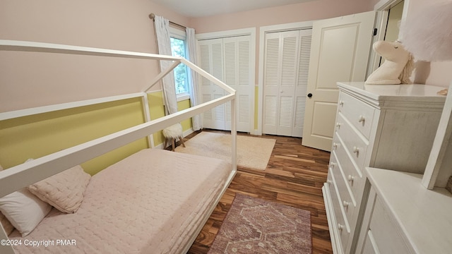 104 Haverhill Rd, Buck Hill Falls, PA 18323 - bedroom featuring multiple closets and dark wood finished floors