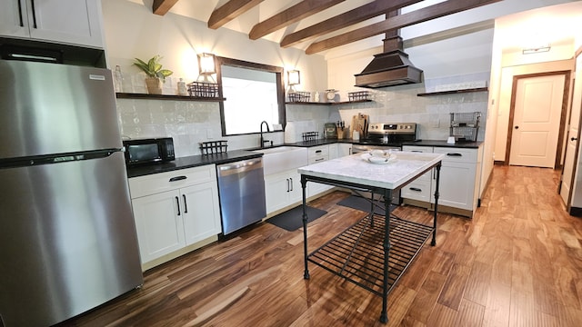 104 Haverhill Rd, Buck Hill Falls, PA 18323 - kitchen with appliances with stainless steel finishes, open shelves, dark wood-type flooring, tasteful backsplash, and beam ceiling