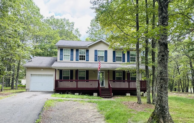 2149 Valley View Dr, Bushkill, PA 18324 - colonial inspired home with an attached garage, covered porch, and driveway