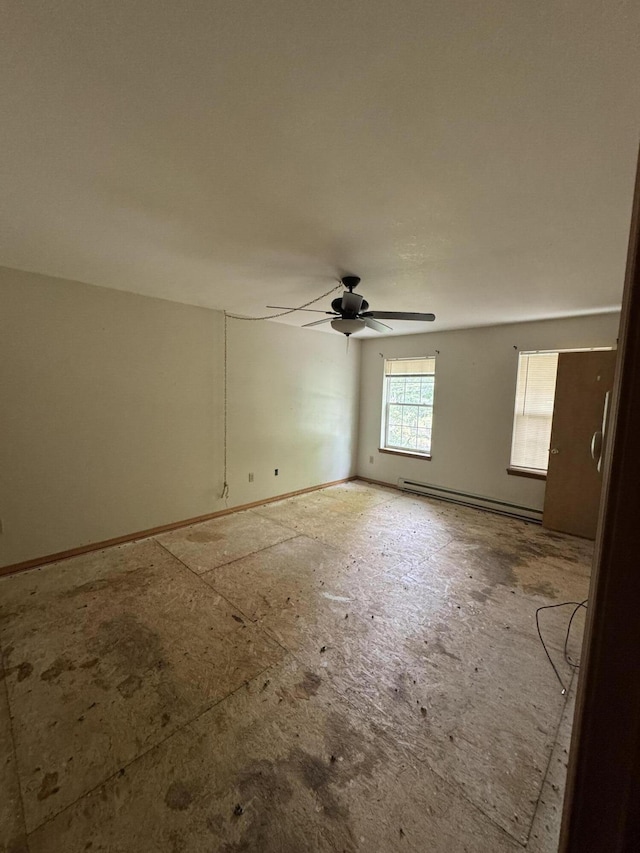 2149 Valley View Dr, Bushkill, PA 18324 - empty room with a baseboard heating unit and ceiling fan