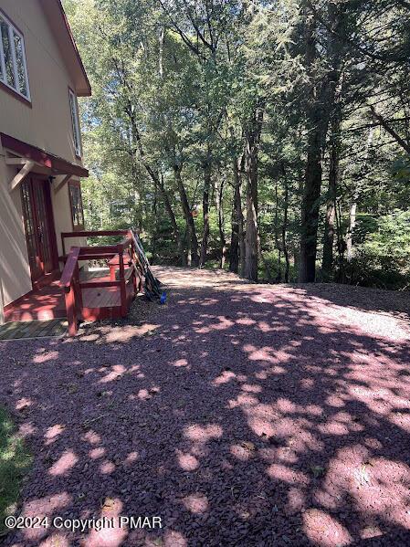 view of yard featuring a view of trees