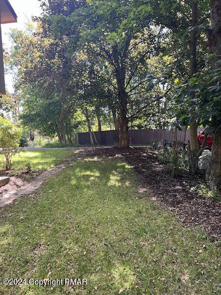 view of yard featuring fence