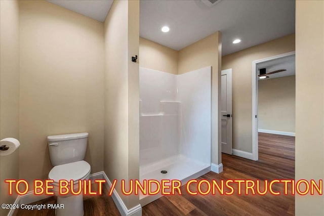84 Parker Trl, Albrightsville, PA 18210 - bathroom featuring baseboards, wood finished floors, toilet, recessed lighting, and a walk in shower