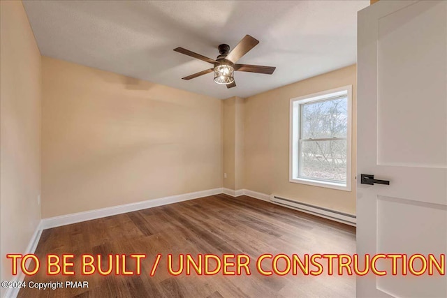 84 Parker Trl, Albrightsville, PA 18210 - spare room with a ceiling fan, wood finished floors, baseboards, and baseboard heating