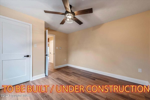 84 Parker Trl, Albrightsville, PA 18210 - unfurnished bedroom featuring baseboards, ceiling fan, and wood finished floors