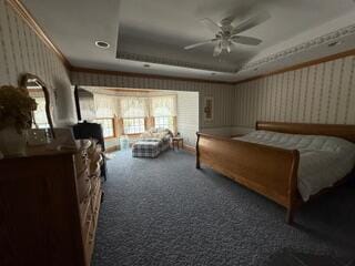 163 Wagner Blvd, Greenfield Township, PA 18407 - bedroom featuring a raised ceiling, wallpapered walls, and carpet flooring