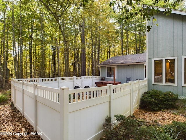 5310 Conoquenissing Dr, Pocono Lake, PA 18347 - exterior space featuring roof with shingles and fence