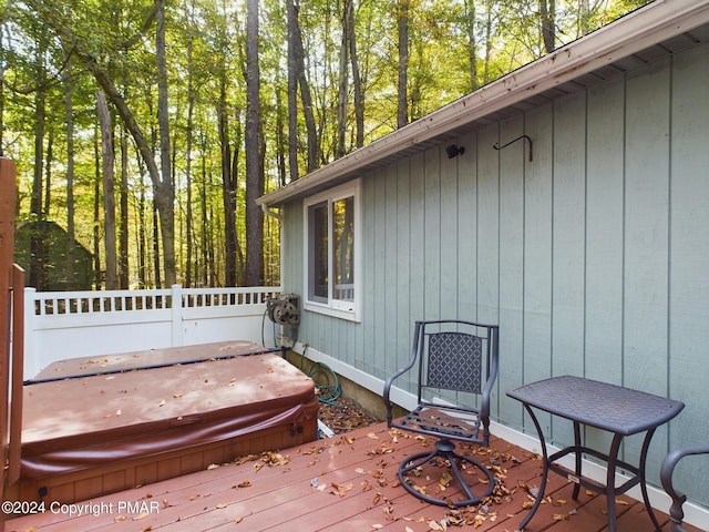5310 Conoquenissing Dr, Pocono Lake, PA 18347 - wooden terrace featuring a covered hot tub