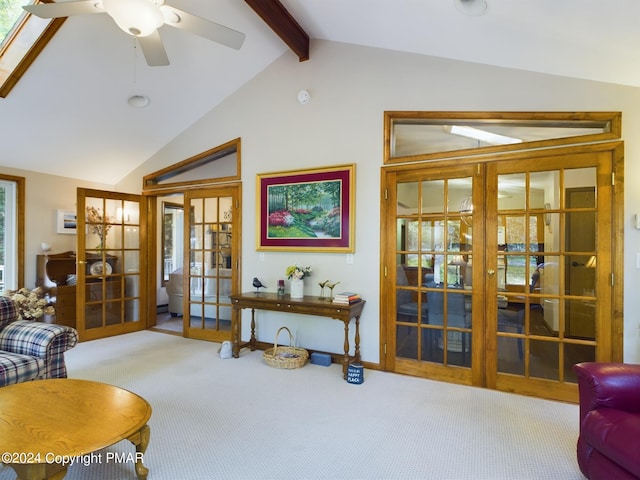 5310 Conoquenissing Dr, Pocono Lake, PA 18347 - sitting room with carpet floors, vaulted ceiling with beams, a ceiling fan, and french doors