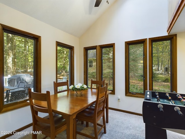 5310 Conoquenissing Dr, Pocono Lake, PA 18347 - carpeted dining room with a ceiling fan, high vaulted ceiling, and baseboards