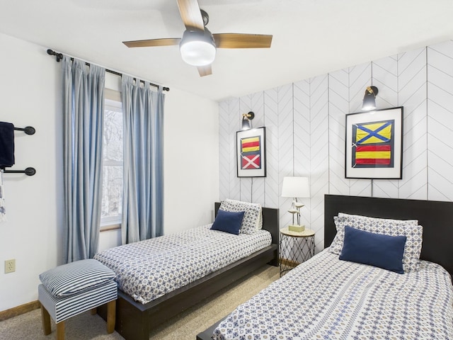 bedroom with carpet flooring, baseboards, and ceiling fan