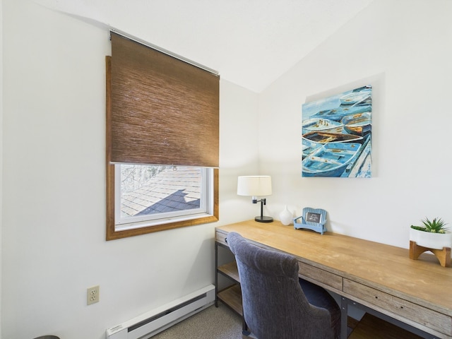 carpeted office featuring built in desk, a baseboard heating unit, baseboards, and vaulted ceiling