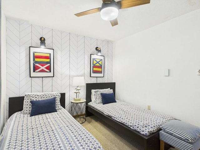 carpeted bedroom featuring a ceiling fan