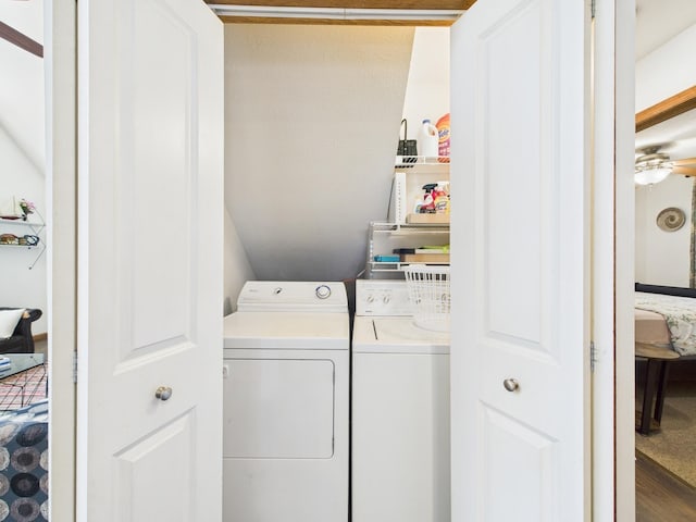 laundry area featuring washing machine and dryer and laundry area