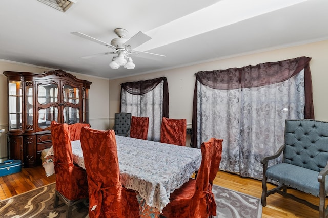 109 Little Doe Ln, East Stroudsburg, PA 18301 - dining area with wood finished floors, crown molding, and ceiling fan