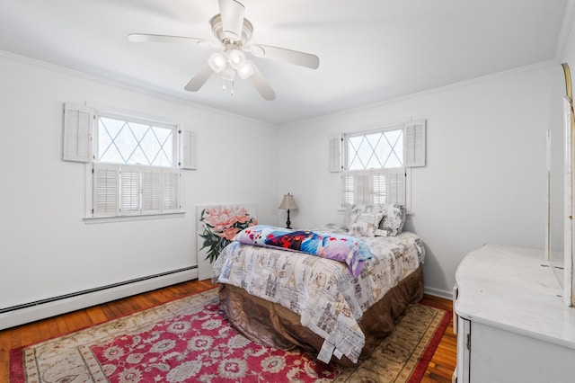 109 Little Doe Ln, East Stroudsburg, PA 18301 - bedroom with ornamental molding, multiple windows, a baseboard radiator, and wood finished floors