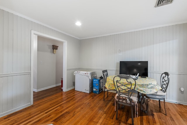 109 Little Doe Ln, East Stroudsburg, PA 18301 - dining area featuring hardwood / wood-style floors, crown molding, and wood walls