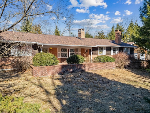 109 Little Doe Ln, East Stroudsburg, PA 18301 - ranch-style home with a chimney and brick siding