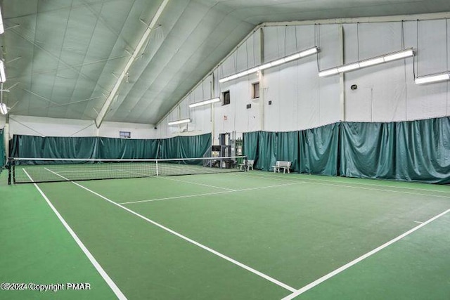 view of tennis court with fence