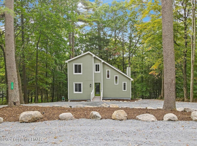 view of front of property featuring a chimney