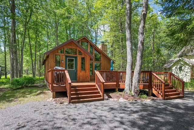 2107 Oak Rd, Pocono Pines, PA 18350 - view of front of house featuring a chimney and a wooden deck