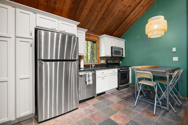 2107 Oak Rd, Pocono Pines, PA 18350 - kitchen with stainless steel appliances, wood ceiling, stone tile flooring, a sink, and lofted ceiling