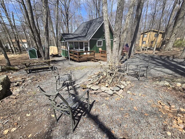 176 Fawn Rd, Pocono Lake, PA 18347 - exterior space with a wooden deck and a shingled roof
