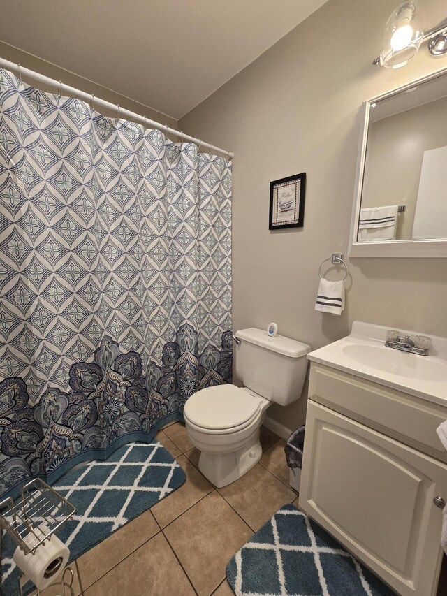 176 Fawn Rd, Pocono Lake, PA 18347 - bathroom featuring tile patterned flooring, toilet, vanity, and a shower with curtain