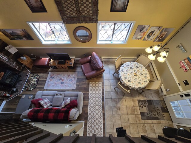 176 Fawn Rd, Pocono Lake, PA 18347 - living room featuring a skylight, a high ceiling, and a healthy amount of sunlight
