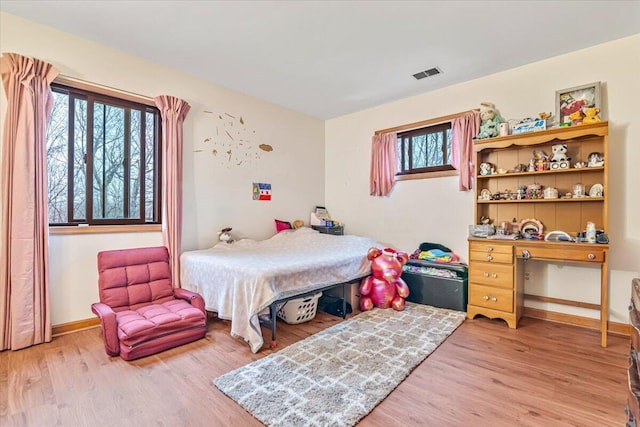 232 Image Dr, Scotrun, PA 18355 - bedroom with visible vents, light wood finished floors, and baseboards