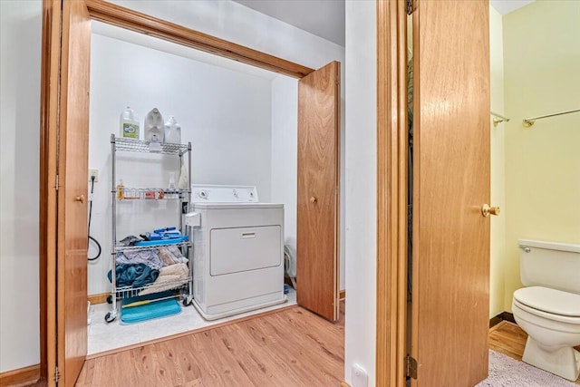 232 Image Dr, Scotrun, PA 18355 - clothes washing area featuring baseboards, laundry area, washer / dryer, and wood finished floors