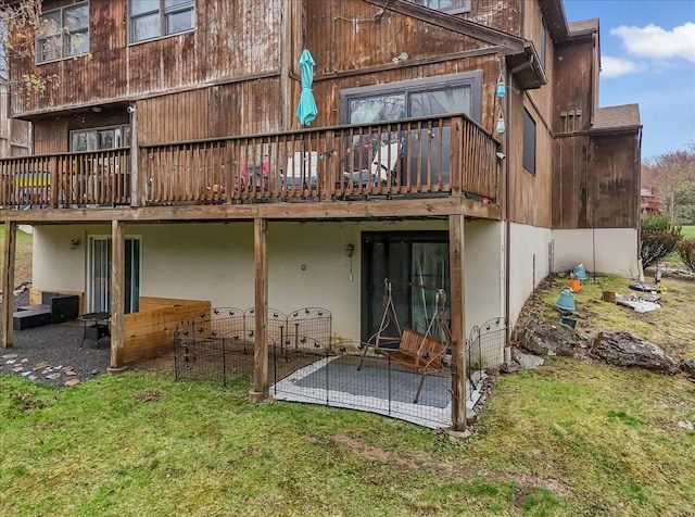 232 Image Dr, Scotrun, PA 18355 - back of property featuring a wooden deck, a patio, and a lawn