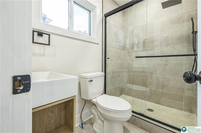 242 E Hazard St, Summit Hill, PA 18250 - full bathroom featuring a shower stall, toilet, vanity, and baseboards