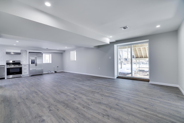 8263 Natures Dr, Tobyhanna, PA 18466 - unfurnished living room with dark wood-type flooring, baseboards, and recessed lighting