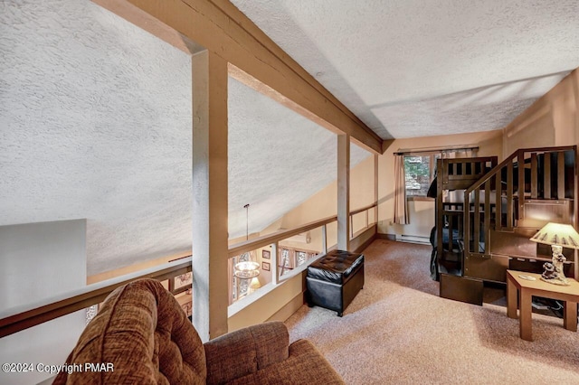 carpeted living room featuring a textured ceiling, beam ceiling, and baseboards