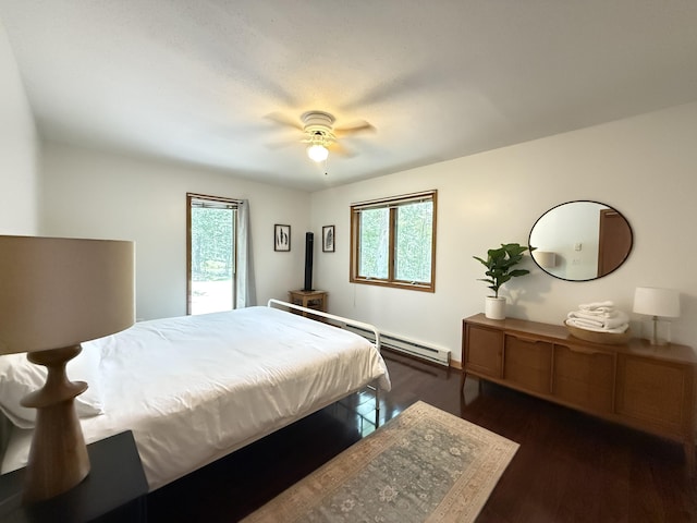 6414 Decker Rd, Bushkill, PA 18324 - bedroom featuring wood finished floors, ceiling fan, and baseboard heating