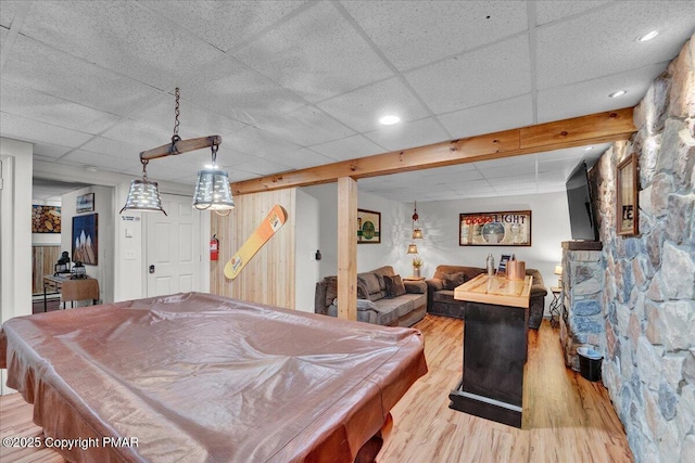 playroom featuring a drop ceiling, billiards, and light wood-style floors