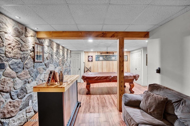 playroom with a paneled ceiling, light wood-style flooring, and pool table