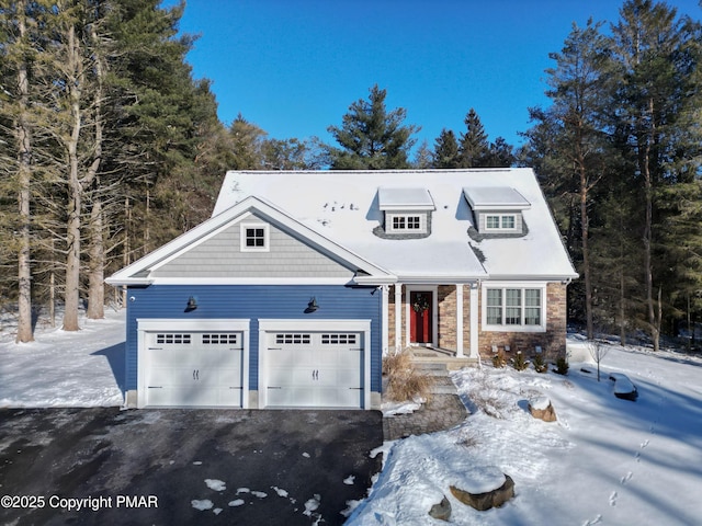 cape cod house with a garage