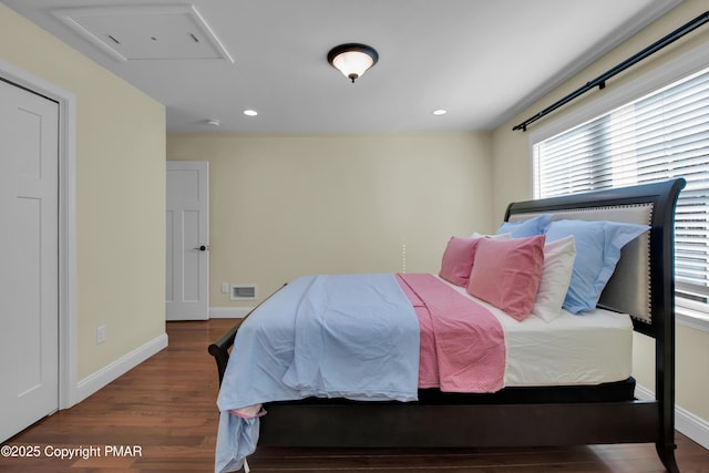 bedroom featuring recessed lighting, wood finished floors, visible vents, and baseboards