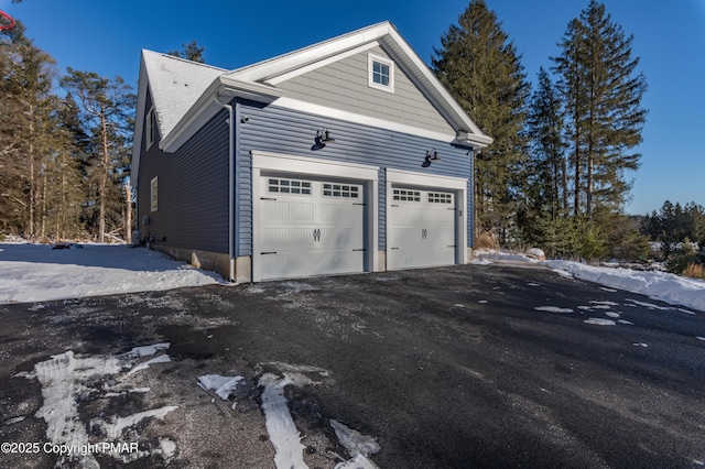 view of snow covered garage