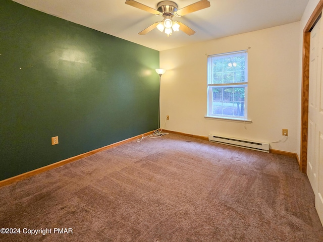 empty room with a baseboard radiator, carpet flooring, a ceiling fan, and baseboards