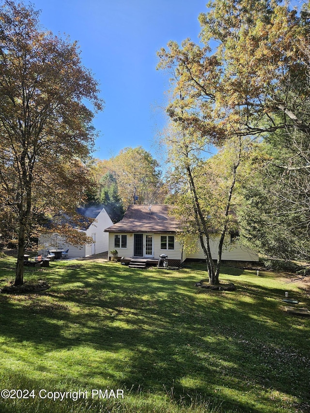 exterior space with a front yard