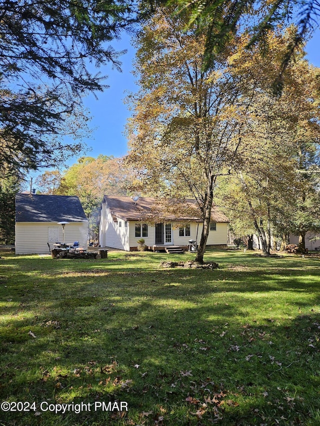 exterior space featuring a front lawn