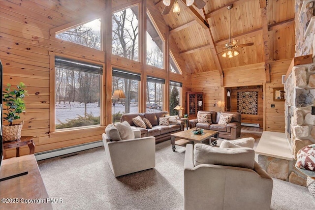 carpeted living room with a baseboard heating unit, wood ceiling, wooden walls, high vaulted ceiling, and beamed ceiling